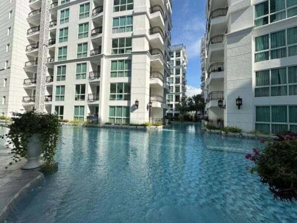 Spacious one-bedroom Olympus Condo with a stunning pool view and modern decor.