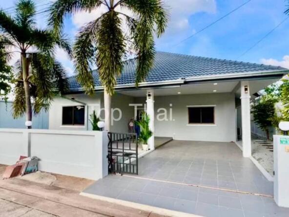 Luxurious 3-bedroom pool villa with modern kitchen and spacious living area.