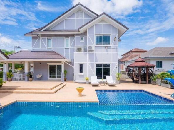Luxurious Sukhumvit pool villa with spacious interiors and a large outdoor swimming pool