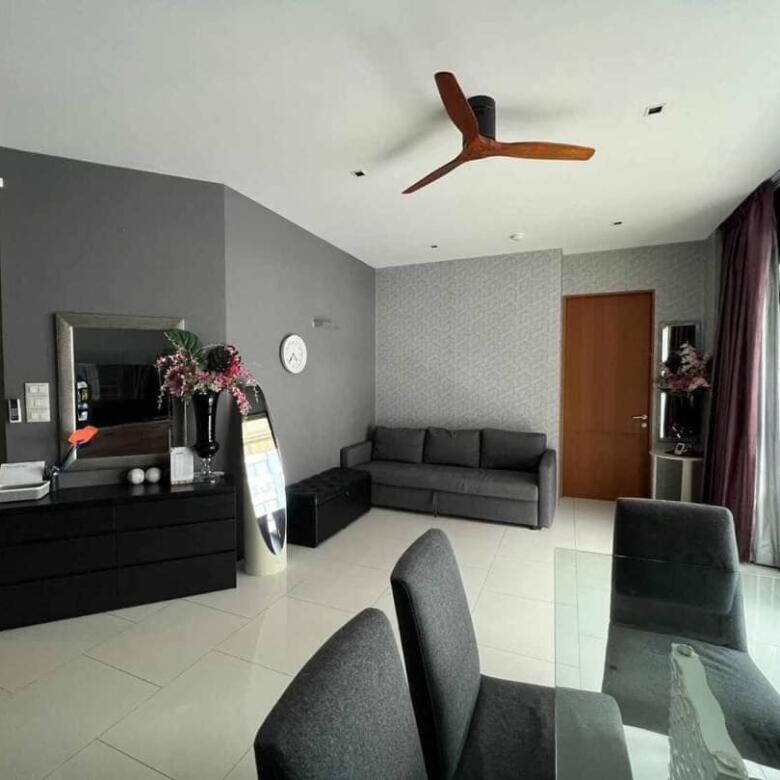Elegant 2-bedroom Sanctuary Condominium interior with modern furnishings and ample natural light