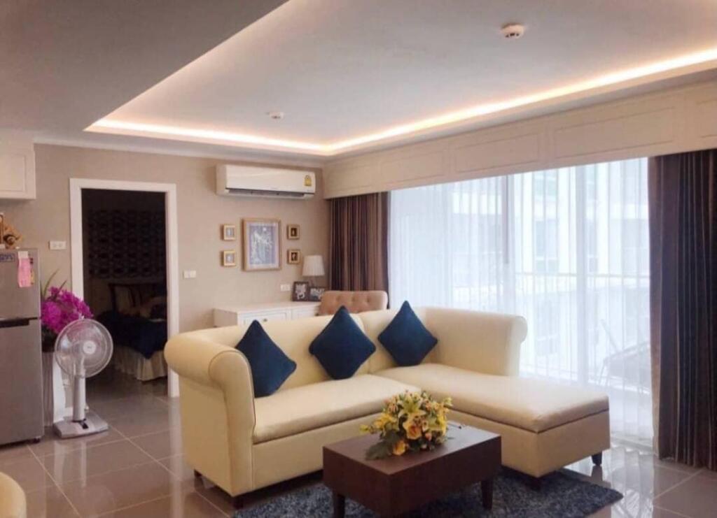 Spacious living room in The Orient Resort 2-Bedroom Apartment with elegant furnishings.