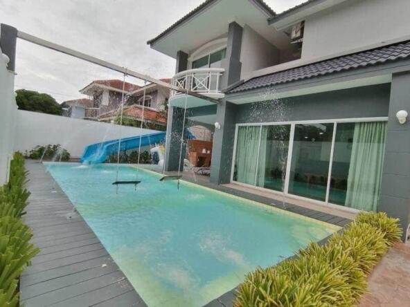 Luxurious Baan Pool Villa Pattaya exterior view with a stunning pool