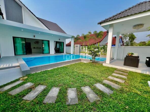 Luxury 3-bedroom villa with private pool and lush garden near Soi Siam Country Club.