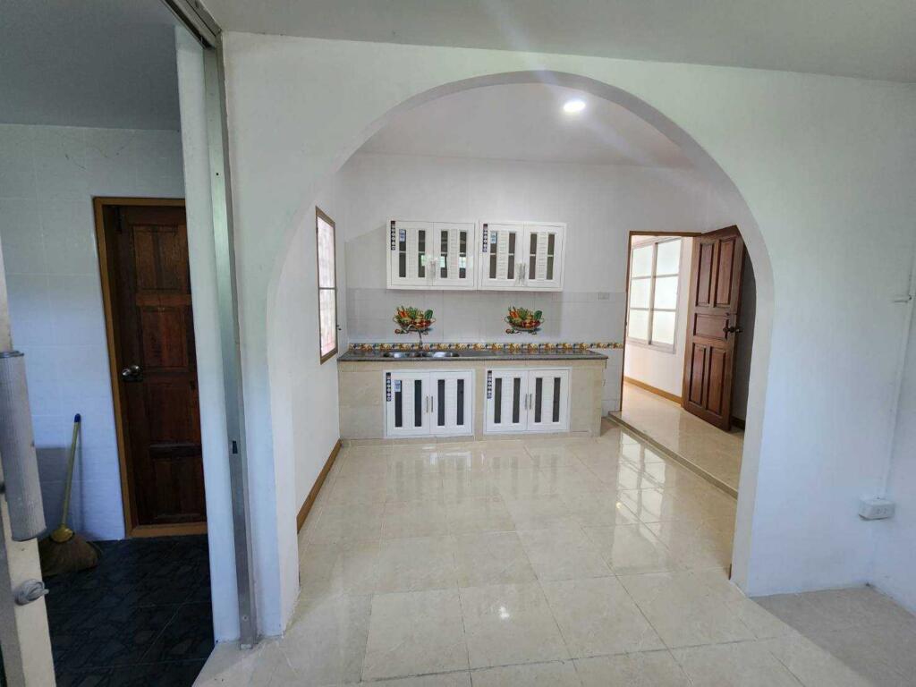 Spacious and well-lit living room inside the Sirisa 9 home, Pattaya."