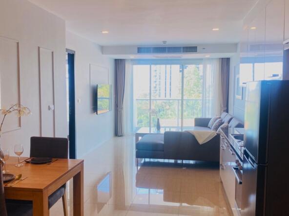 Spacious living area in Pratumnak Hill Condo, fully furnished with elegant decor
