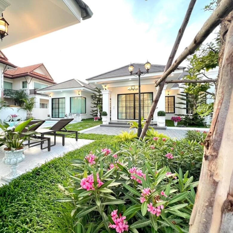 Elegant TW Wanasin pool villa surrounded by lush greenery