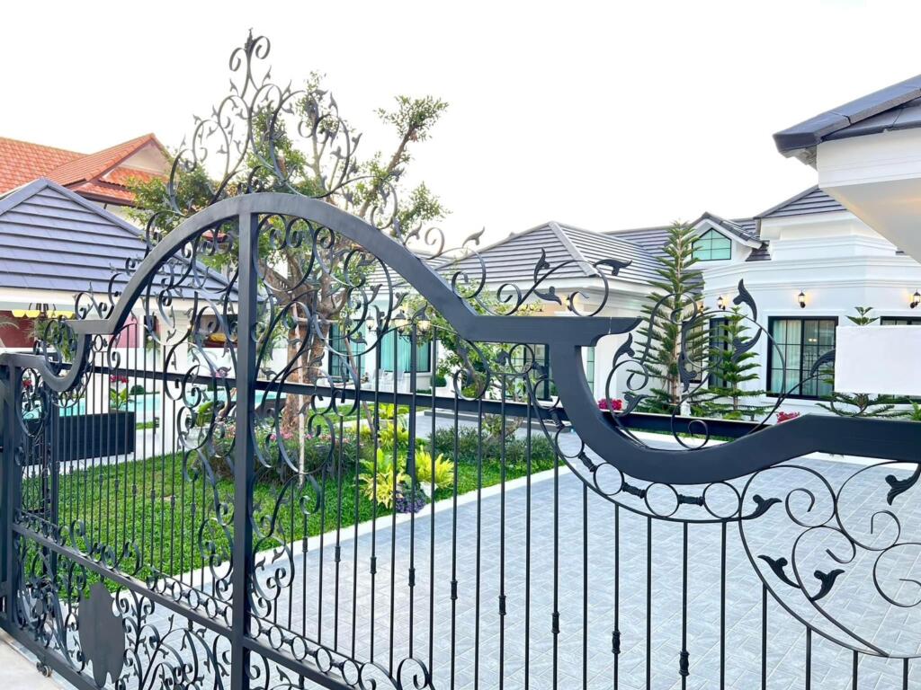Elegant TW Wanasin pool villa surrounded by lush greenery