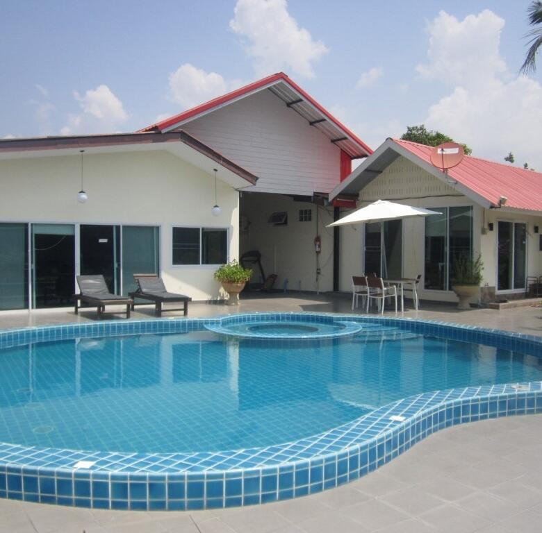 Serene 50-room resort nestled in East Pattaya's lush landscape.