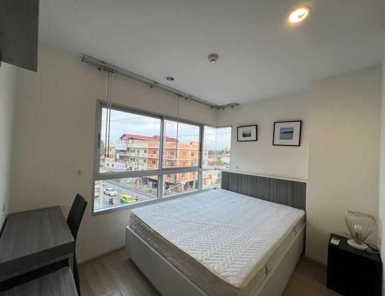 Modern 2-bedroom condo at The Grass Condo Pattaya on the 5th floor with a city view.