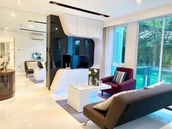 Modern 2-bedroom condo interior at City Center Residence in Pattaya with cityscape views.
