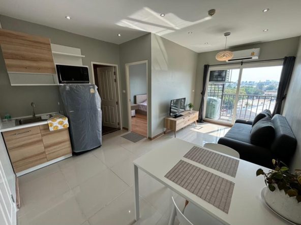 Modern one-bedroom condo for sale in South Pattaya with city views.
