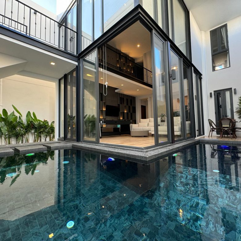 Luxury pool villa for sale on Thappraya Road, Jomtien Beach, featuring 4 bedrooms, 5 bathrooms, and premium amenities.