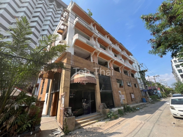 Exterior view of a 35-room boutique hotel for sale in Jomtien, 150 meters from the beach.