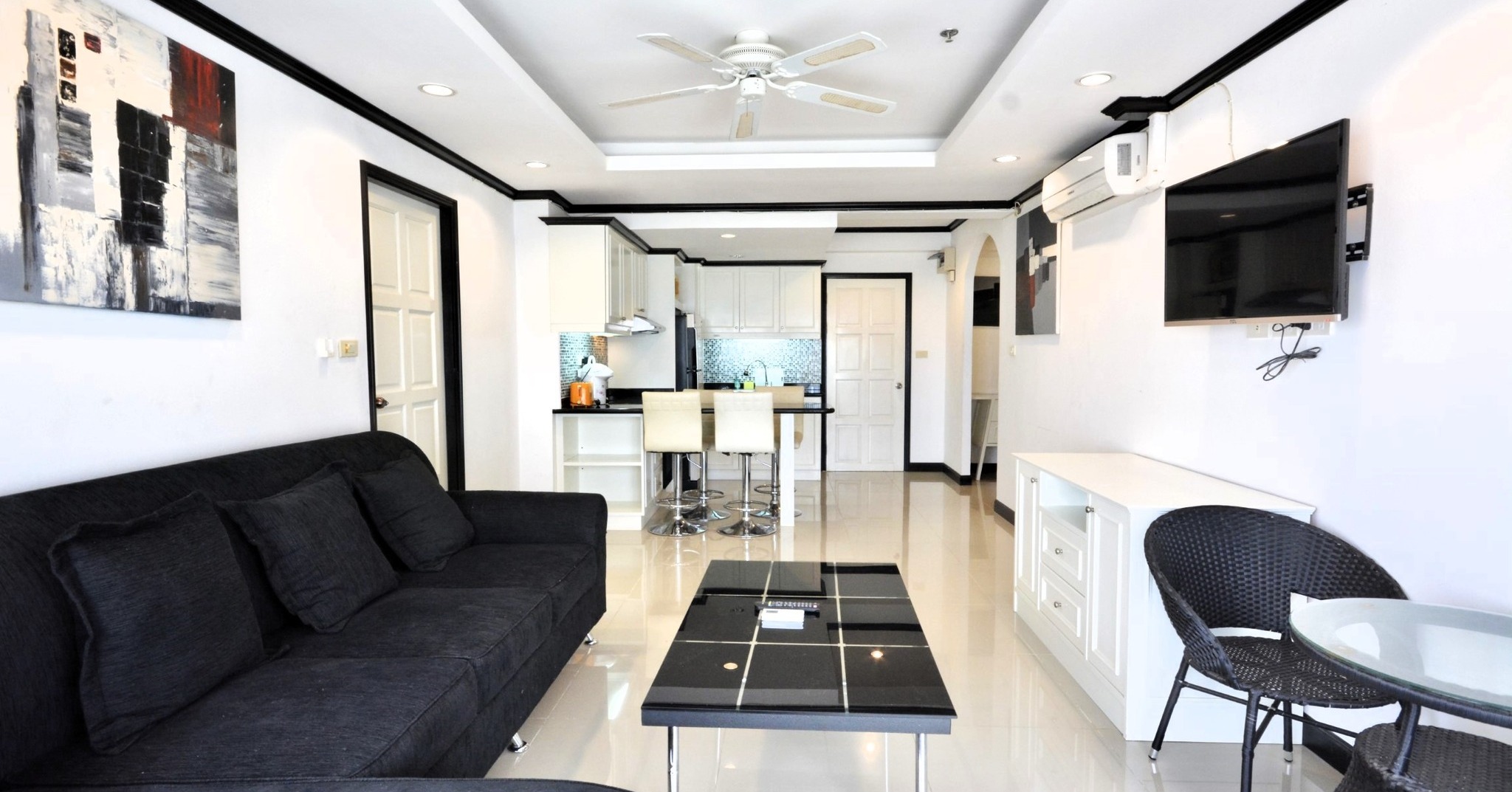 Fully furnished living room in a 2-bedroom condo at Jomtien Beach Condominium.