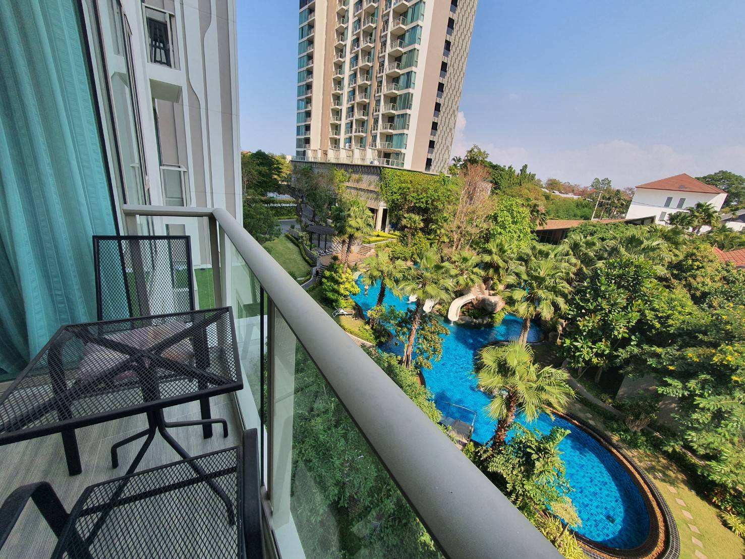“Garden view from balcony of Riviera Wongamat Pattaya condo for sale”