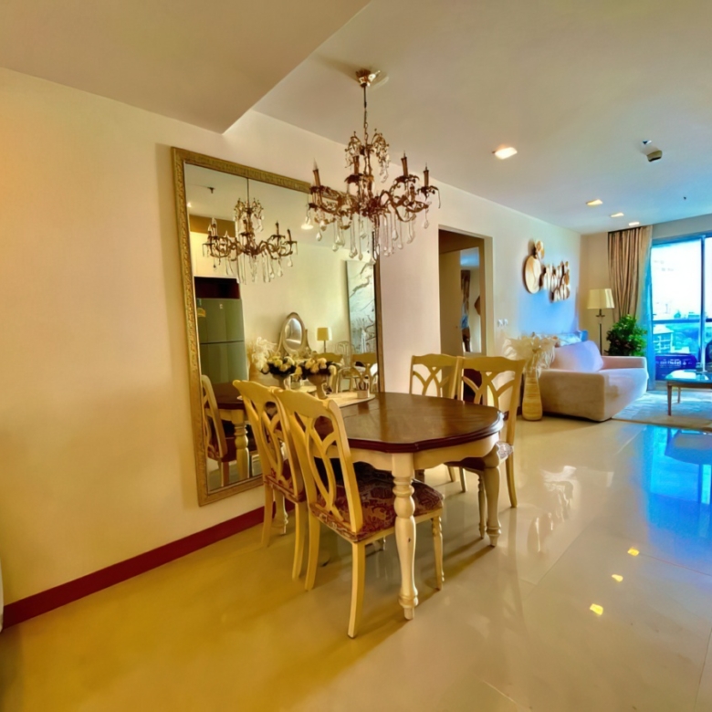 “Spacious living room in 2-bedroom Palm Condotel Pattaya condo for sale”