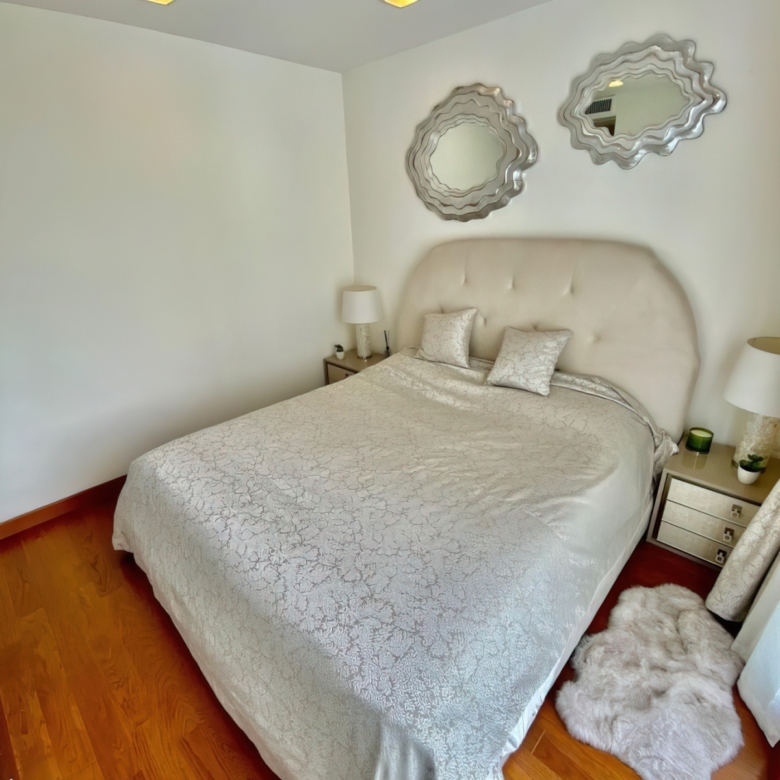 “Modern furnished bedroom in Palm Condotel Pattaya apartment for sale”