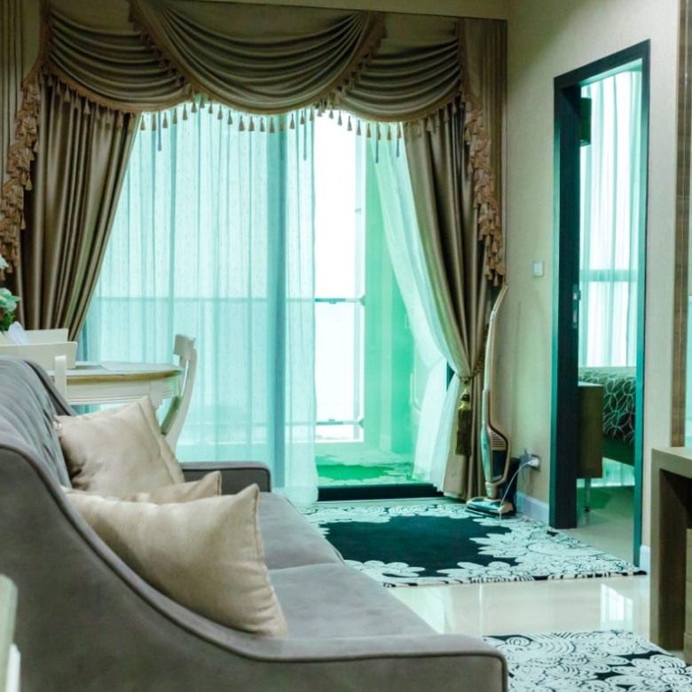 “Sea view living room in 2-bedroom Dusit Grand Condo View condo for sale Jomtien”