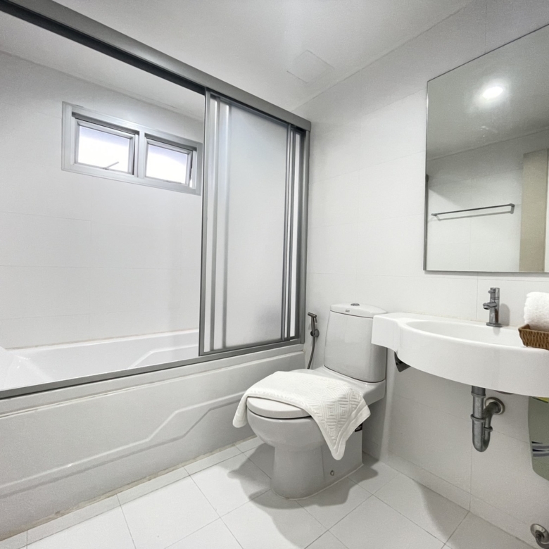 “Living room with sea view in 2-bedroom condo for sale Lumpini Park Beach Jomtien Pattaya”