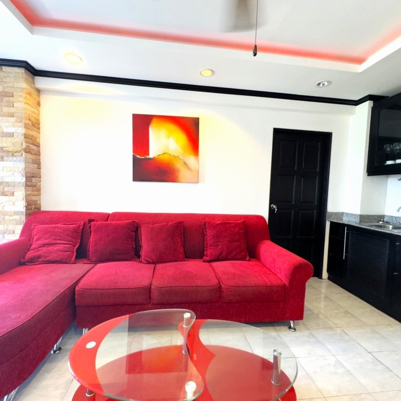 Spacious furnished living room in Jomtien Beach condo for sale Pattaya