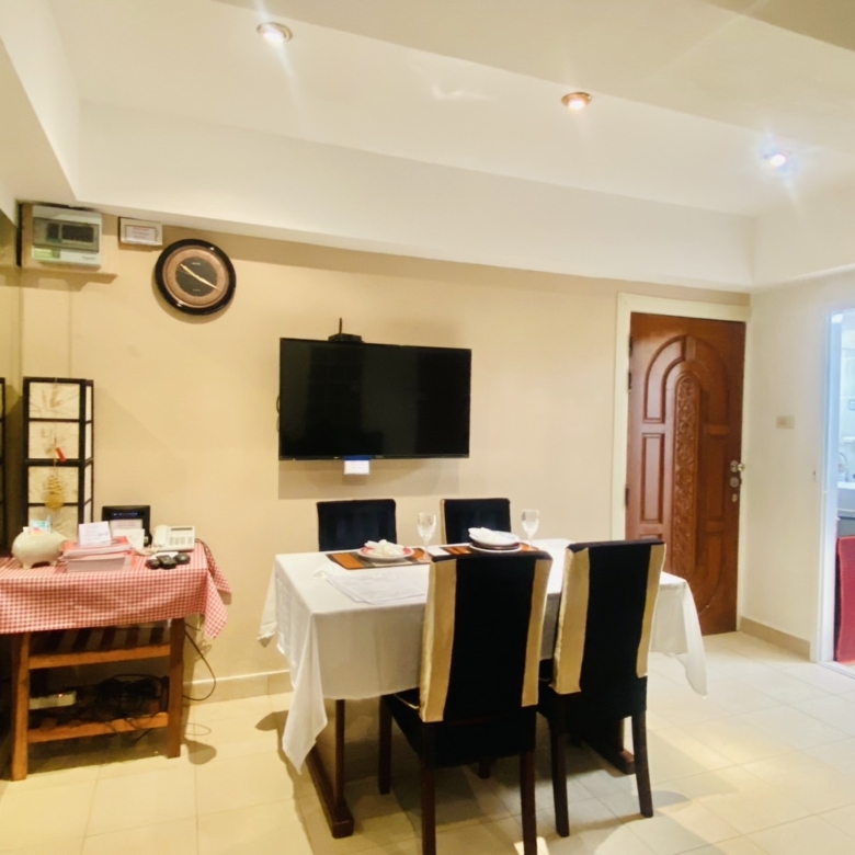 “Spacious living room in 1-bedroom Center Condotel condo for sale South Pattaya”