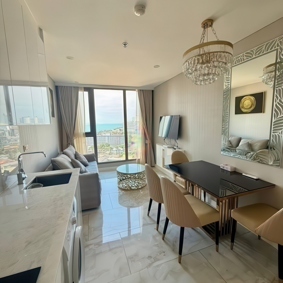 Fully furnished living room with balcony facing Jomtien Bay – Copacabana condo
